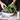 a man preparing kale in a bowl