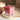 a glass of a dairy-free raspberry muffin smoothie with raspberries on top
