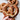someone holding a vegan soft pretzel