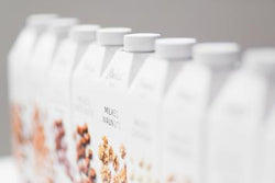 cartons of Elmhurst plant-based milks showing their packaging