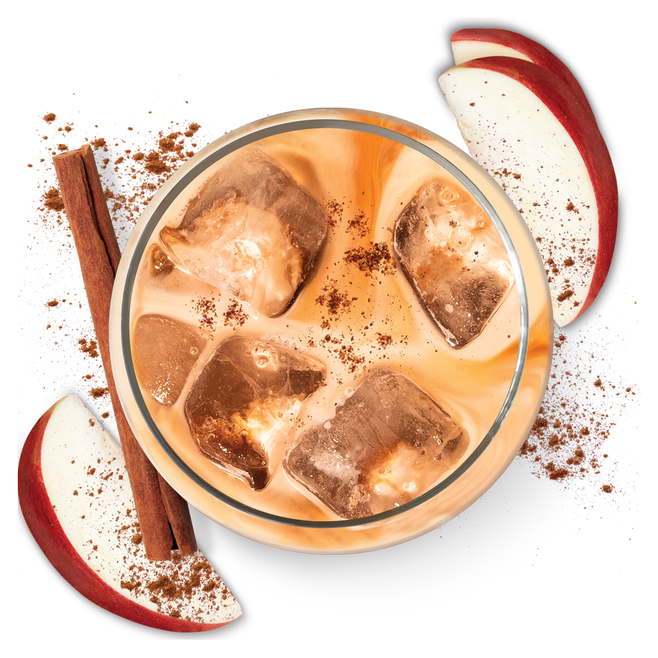 A glass of iced coffee with cream, topped with ice cubes and sprinkled with cinnamon, surrounded by apple slices and a cinnamon stick on a white surface.